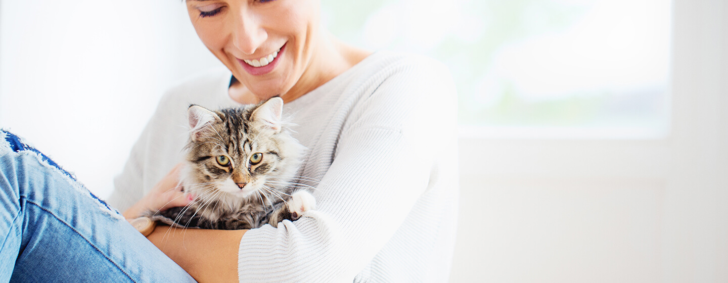 Woman holding cat