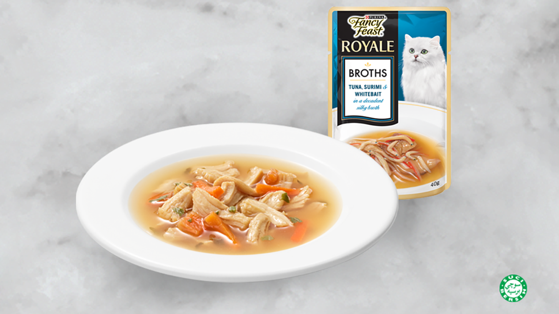 Fancy Feast Broth plated on a nice white plate