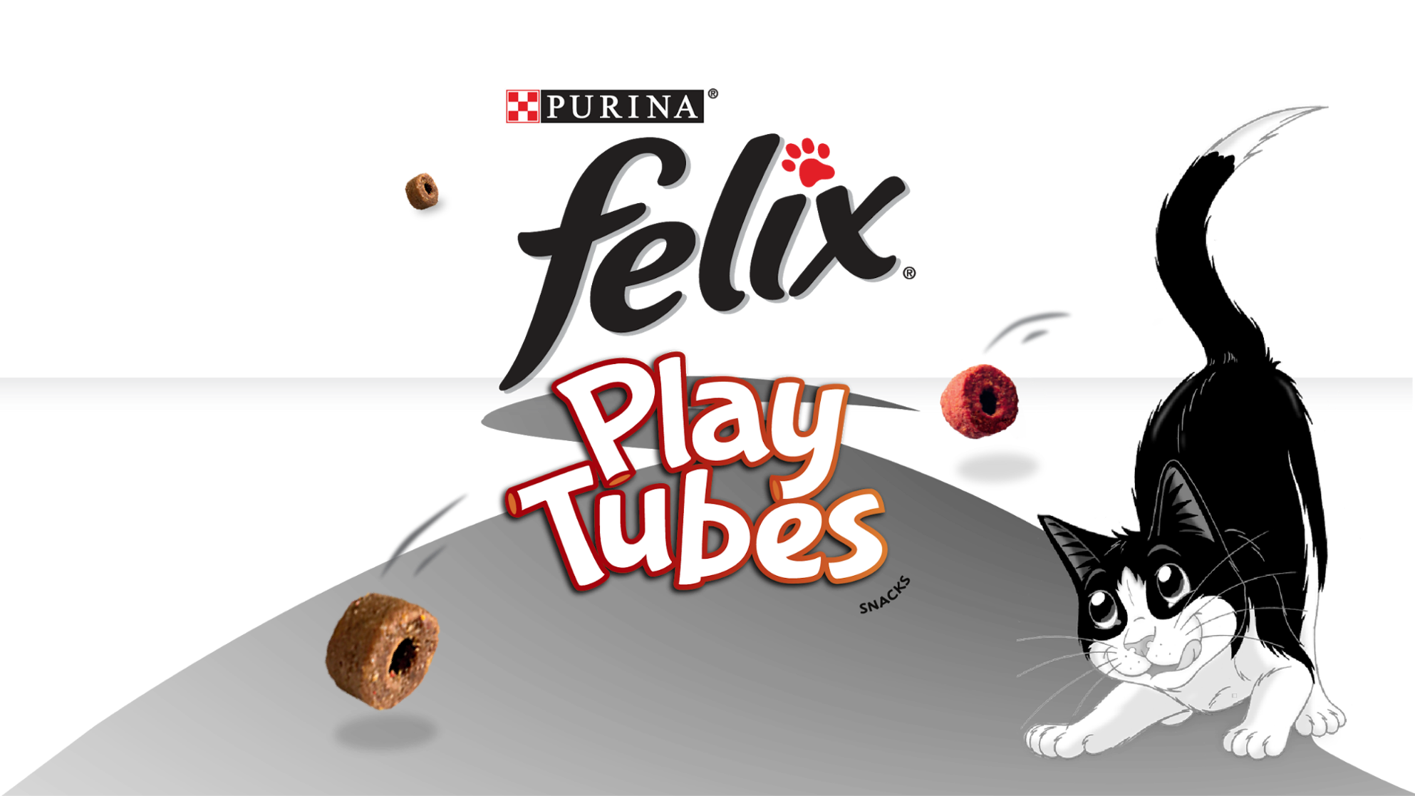 Felix black cat chasing for a Felix Play Tubes snack