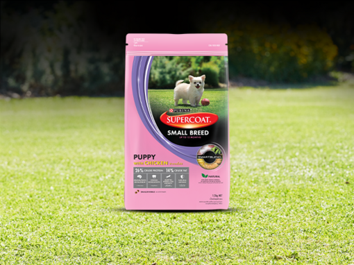 Supercoat Puppy Dog Food Product Packs on Grass